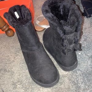 Black fur boots for winter